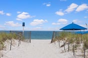 Poolside Condo with Beach Access