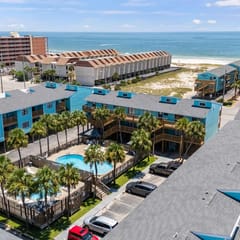 Poolside Condo with Beach Access